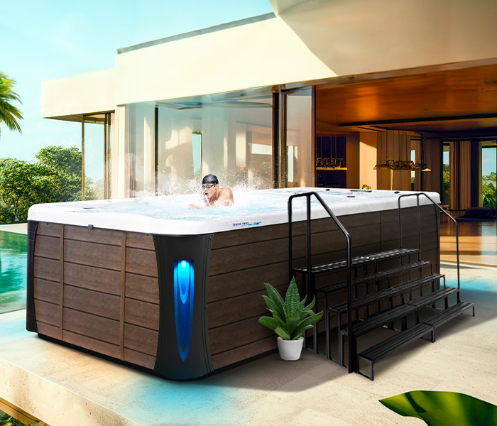 Calspas hot tub being used in a family setting - Redford
